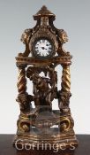 An 18th century Continental carved giltwood mantel timepiece, with watch movement, 15in.