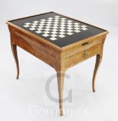 A Louis XVI tulipwood combined writing and games table, the reversible rectangular top with brown