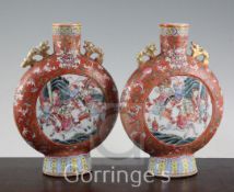 A pair of Chinese famille rose moon flasks, 19th century, each painted with battle scenes, 24.2cm,