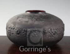 An Amphora stoneware compressed globular vase, 20th century, with matt black volcanic lava like