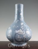 A Chinese Claire de Lune glazed bottle vase, Qianlong seal mark but later, white slip decorated with