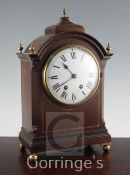 An Edwardian inlaid mahogany mantel clock, with French movement, 16in.