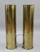 A pair of Karlsruhe Patronen Fabrik brass naval shell cases, stamped Juli 1918, H.40.5in.