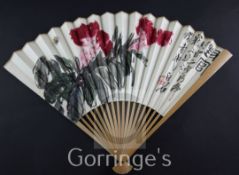 A Chinese bamboo and painted leaf fan, decorated with a bee and flowers and calligraphic