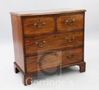 A George III style mahogany chest, of two short and two long drawers, W.2ft 10in.