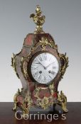 A French ormolu mounted red boulle mantel clock, 16in.