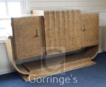 An Art Deco, probably Epstein, burr wood sideboard, with four doors, on U shaped underframe, W.5ft
