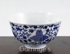 A Chinese blue and white bowl, Guangxu mark but later, painted with flowers and scrolling foliate to
