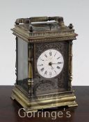 A late 19th century French brass hour repeating carriage clock, with enamelled dial signed Axam'd by