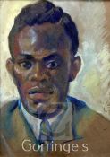 T M 1946watercolour on brown paper,Portrait of a black man,monogrammed and dated 1946,13 x 10in.