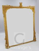 A Victorian gold painted gilt gesso overmantel mirror, W.5ft