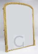 A Victorian gilt and gesso overmantel mirror, with egg and dart style border, with stiff leaf