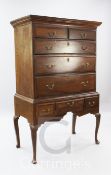 A George II style crossbanded oak and pine chest on stand, W.3ft 4in.