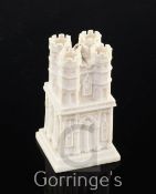 A European ivory 'castle' chess piece, 19th century, 5.9cm