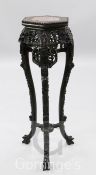 A late 19th century Chinese carved hardwood hexagonal vase stand, with marble inset top, H.3ft