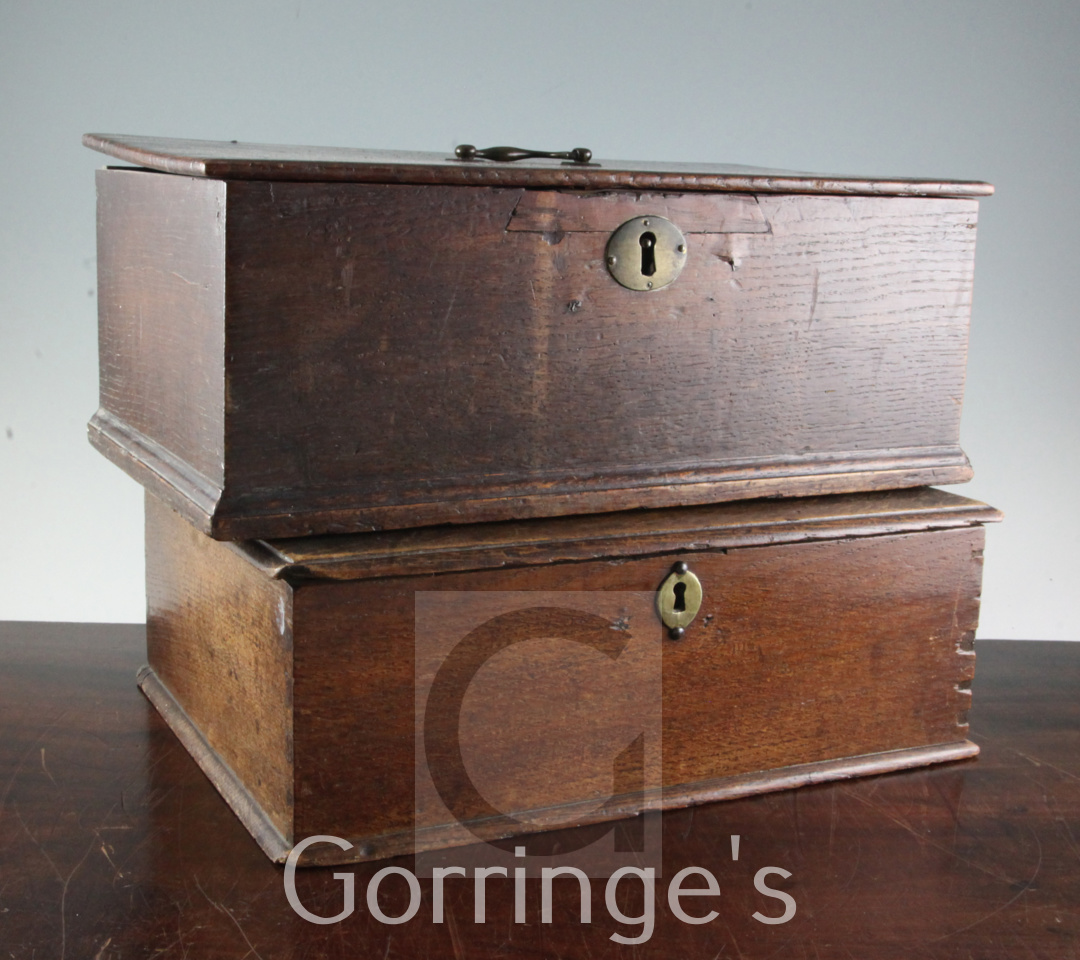 Two small 18th century oak boxes, each plain with moulded top edges, 17in. and 15in.