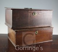 Two small 18th century oak boxes, each plain with moulded top edges, 17in. and 15in.