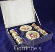 A boxed Aynsley fruit decorated coffee set, for six place settings