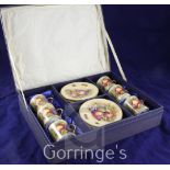 A boxed Aynsley fruit decorated coffee set, for six place settings