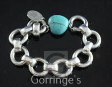 A Peter Farrar of Rye heavy circular link silver bracelet, with heart shaped turquoise drop and
