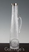 A late Victorian tall silver mounted wrythen glass claret jug by Hukin & Heath, of slender