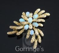 A 14ct gold and white opal spray brooch, gross 7 grams, width approx. 2in.