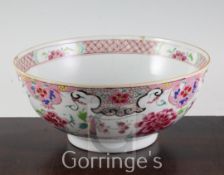 A Chinese famille rose punch bowl, Qianlong period, 22.5cm, cracks and restored chips