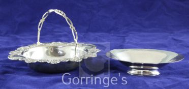 A late 1920's/early 1930's Georg Jensen planished sterling silver oval nut dish, design no. 568C, on
