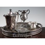 A quantity of assorted plated items including three WMF pieces, two gallery trays, a three piece tea