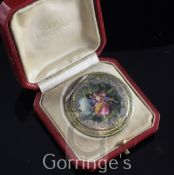 An early 20th century continental silver and yellow guilloche enamel compact in original box, the