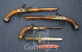 Three 18th century style flintlock pistols and an Eastern dagger