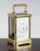 A French brass carriage timepiece, retailed by Hamilton and Inches, height to handle 14.5cm