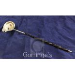 A George III silver toddy ladle, with fluted bowl and demi-spiral twist baleen handle, Thomas