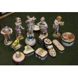 A group of five Continental porcelain Sitzendorf and other figurines and nine boxes, (14)