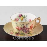 A Royal Worcester blush ground tea cup and saucer, painted with flowers and a collection of twelve