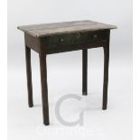 An early 19th century oak side table, fitted one long drawer, raised on square moulded legs, width