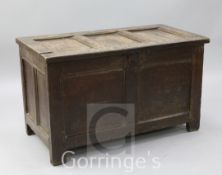 An early 18th century oak coffer, with plain panels and moulded stiles, width 3ft 6in.