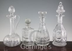 A Victorian cut glass claret jug, two Victorian wine decanters and a square cut glass whisky