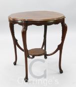 A late Victorian mahogany circular shaped topped two tier occasional table, on cabriole legs, united