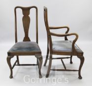 A set of seven Queen Anne style mahogany dining chairs, including one carver