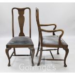 A set of seven Queen Anne style mahogany dining chairs, including one carver