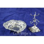 An Edwardian repousse silver ring tree and a bonbon dish, Mitchell Bosley & Co, Birmingham, 1903 and