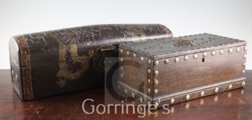 A Chinese domed top box, gilt decorated with dragons, and an oak brass studded box