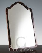 A small tortoiseshell framed wall mirror, with domed top, the plate 15 x 9in.