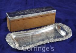 A late 19th century plated snuffers stand, 8.75in and a silver plated toilet box lid, now mounted on