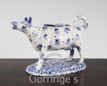A Continental porcelain blue and white cow creamer, 16.5cm