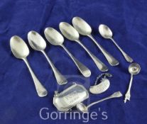 Five Georgian silver tea spoons, (indistinct marks) two later wine labels, two condiment spoons