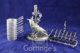 A late Victorian silver plated centrepiece, modelled as a bird beside a flower, by James Deakin &