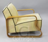 An Alvar Aalto (1898-1976) laminated plywood and birch "padded Paimio chair", model no.44, with