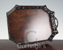 A Chippendale style octagonal fretwork tray, with loop handles, 15in.